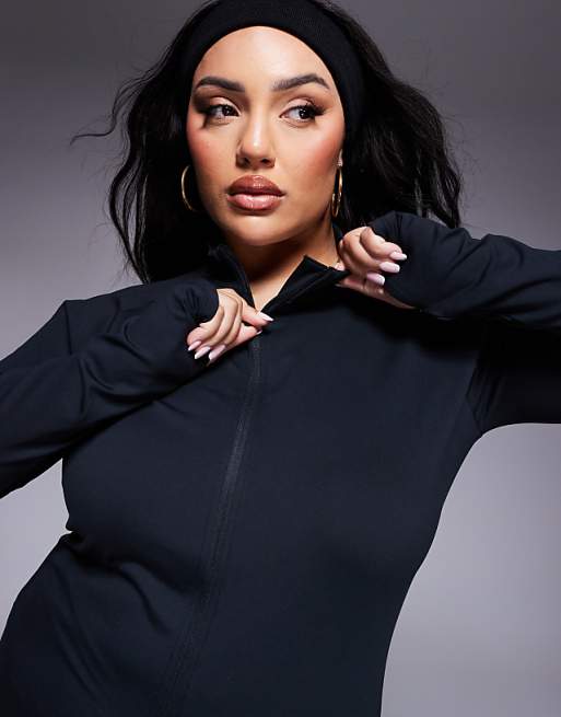 4505 Curve Icon Soft Touch Zip Up Performance Long Sleeve Top In Black