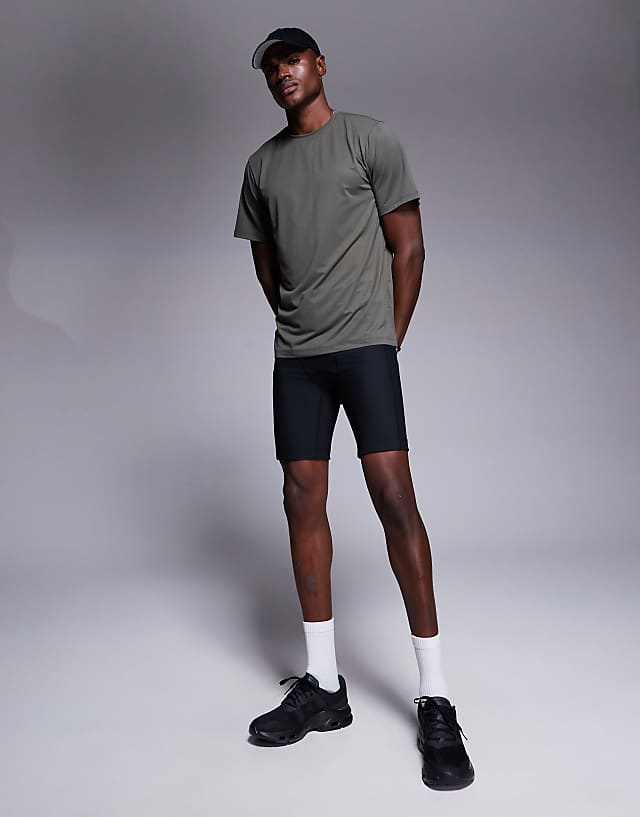 4505 running base layer ribbed legging shorts with phone pocket in black