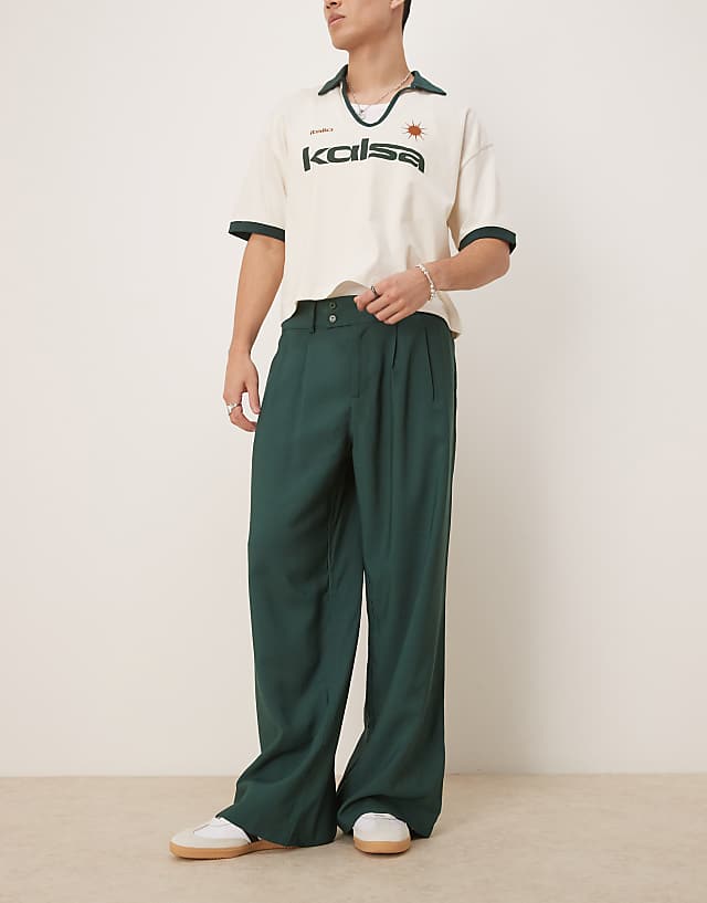 ASOS DESIGN loose fit smart trousers in green