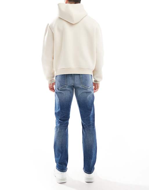 ASOS DESIGN Slim Jeans In Mid Wash Blue