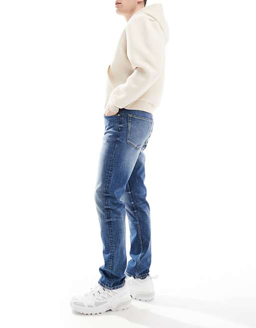 ASOS DESIGN Slim Jeans In Mid Wash Blue