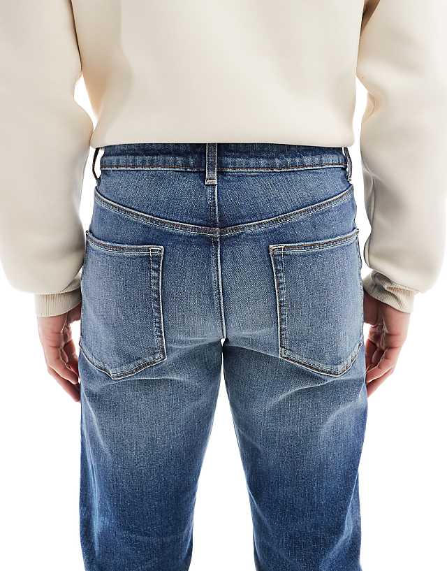 ASOS DESIGN Slim Jeans In Mid Wash Blue