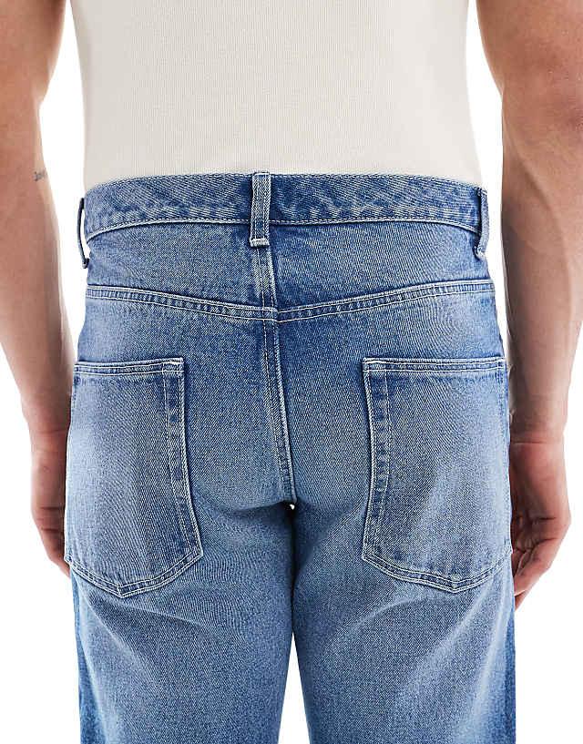 ASOS DESIGN Tapered Jeans In Light Wash Blue