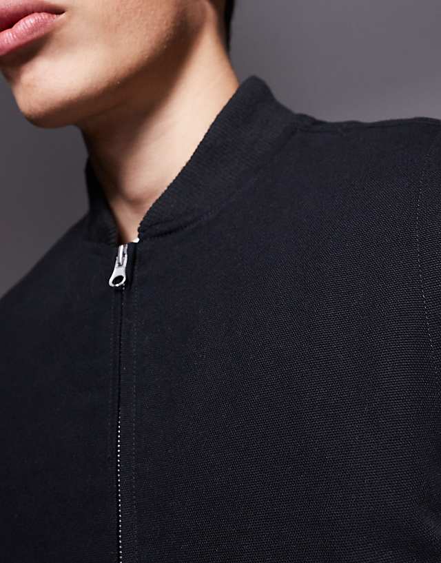 ASOS DESIGN Washed Gilet In Black