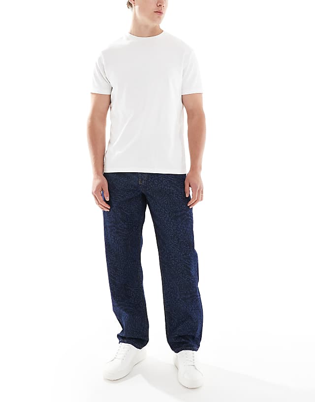 ASOS DESIGN baggy jeans with mixed animal laser print in raw wash