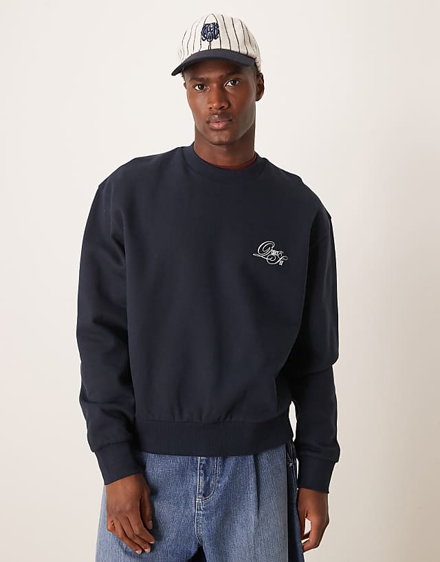 ASOS DESIGN boxy oversized sweatshirt with chest embroidery in navy