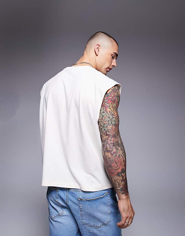 ASOS DESIGN Boxy Oversized Tank With Sports Text Graphic In Cream