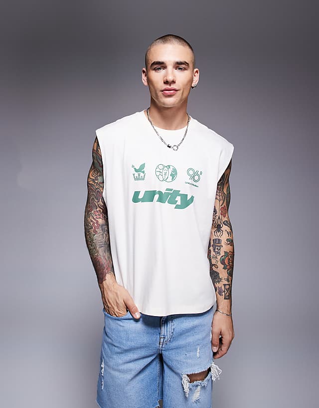 ASOS DESIGN boxy oversized tank with sports text graphic in cream