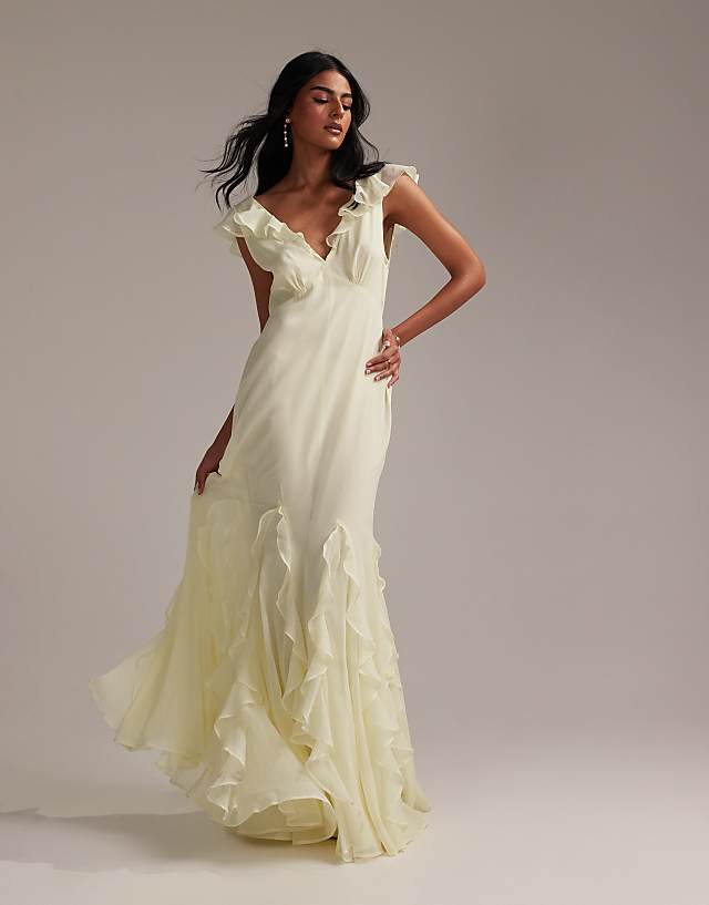 ASOS DESIGN Bridesmaids flutter sleeve bias maxi dress with godet frill hem in soft yellow