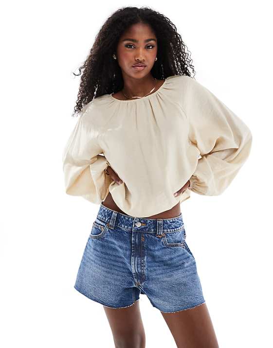 ASOS DESIGN denim relaxed short in midwash blue
