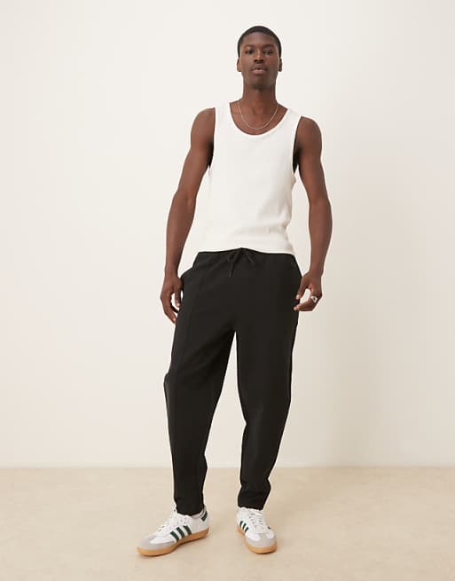 ASOS DESIGN double face tapered joggers with pin tucks in black
