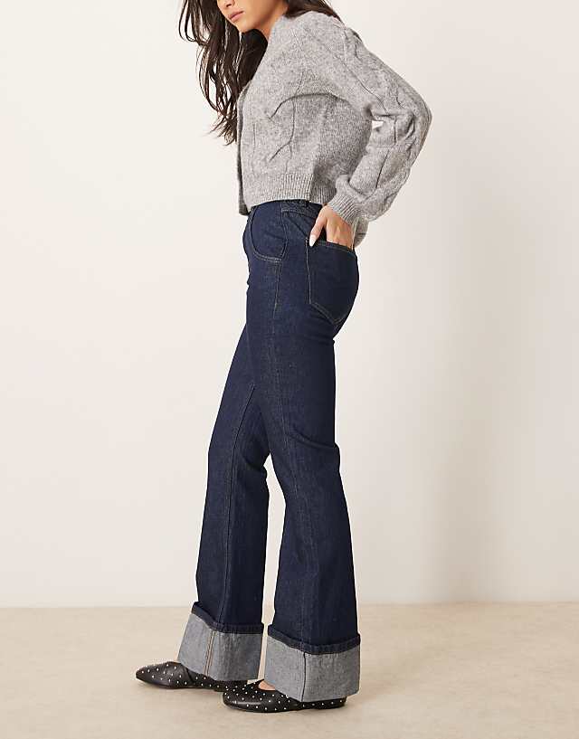 ASOS DESIGN Flared Jean With Turn Up In Indigo