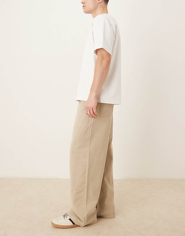 ASOS DESIGN Garment Dye Super Baggy Carpenter Jeans In Beige