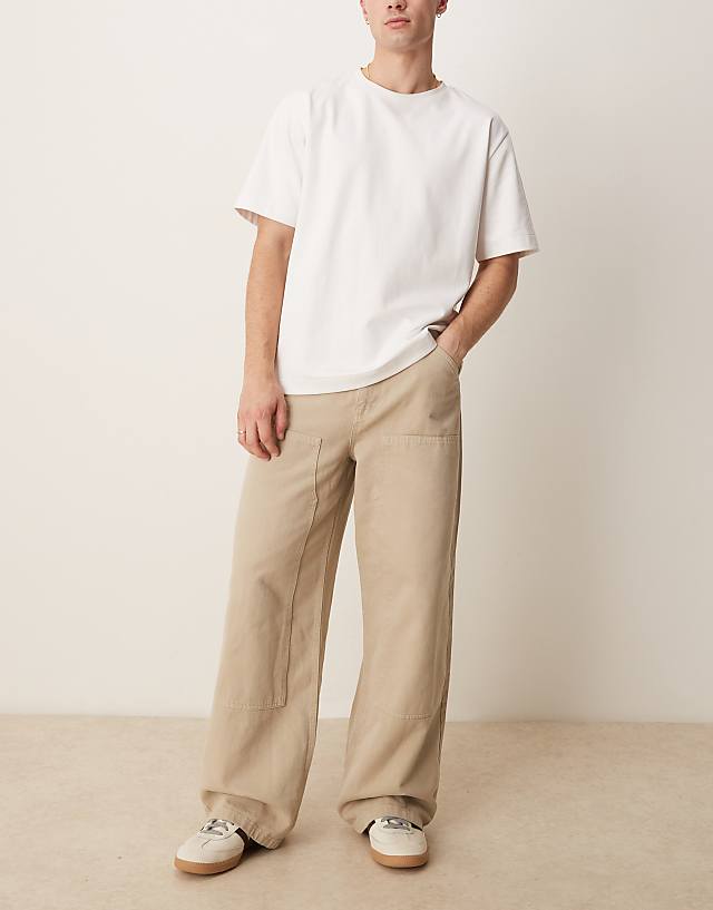 ASOS DESIGN garment dye super baggy carpenter jeans in beige