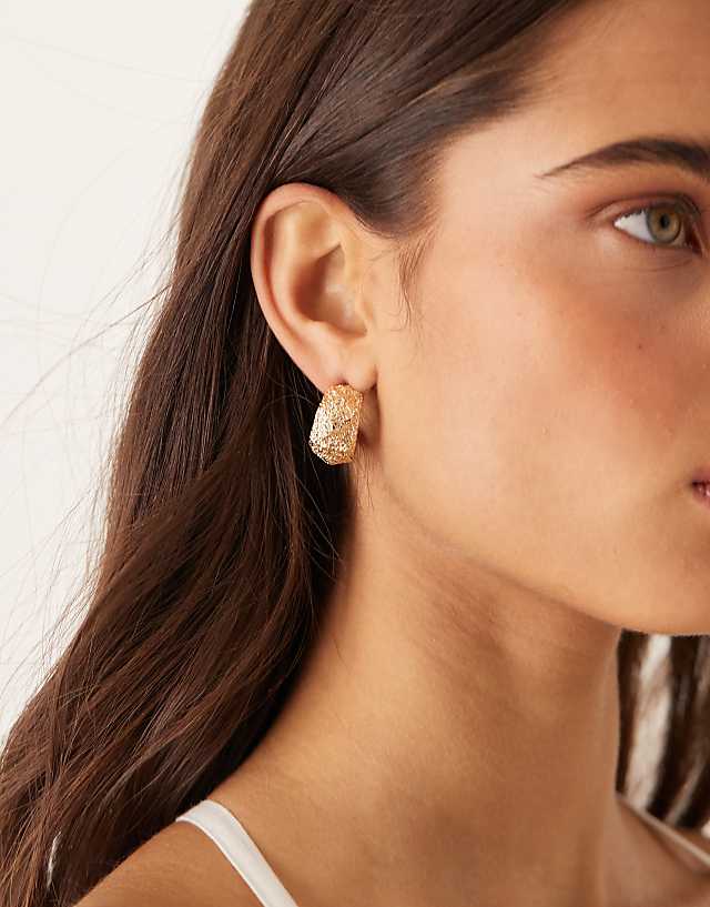 ASOS DESIGN half hoop earrings in textured abstract design in gold tone