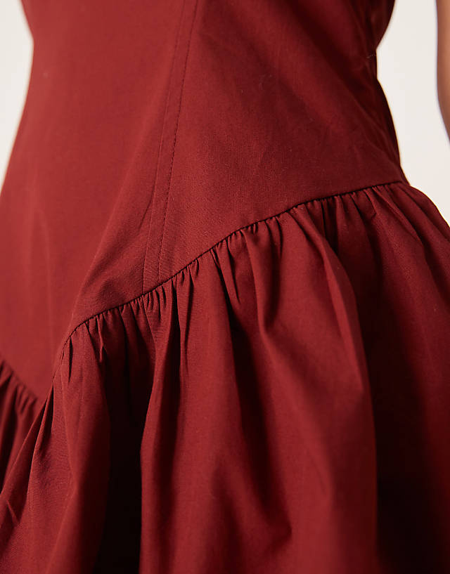 ASOS DESIGN Halter Mini Dress With Ruffle Hem In Burgundy