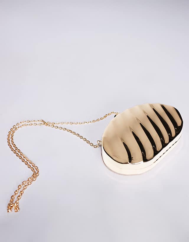 ASOS DESIGN Hardcase Clutch With Wave Pattern In Gold