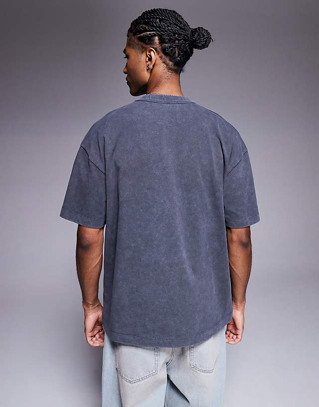 ASOS DESIGN Heayweight Oversized T-shirt With Sports Graphic In Washed Black