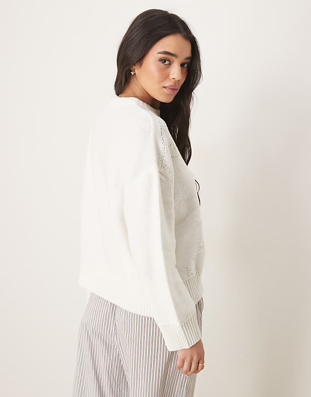 ASOS DESIGN Knitted Crew Neck Jumper With Flower Stitch In Cream