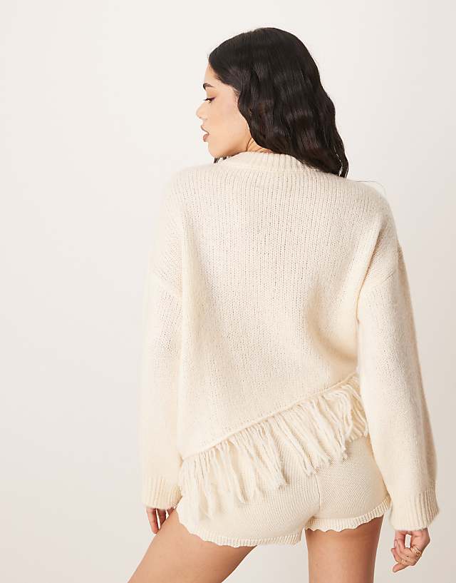 ASOS DESIGN Knitted Crew Neck Jumper With Fringe Hem Detail In Cream