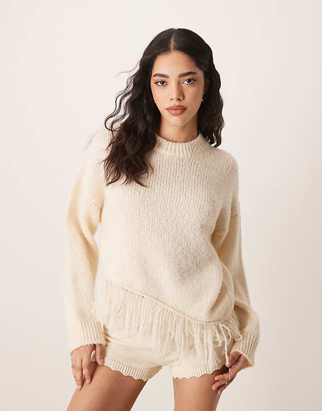 ASOS DESIGN Knitted Crew Neck Jumper With Fringe Hem Detail In Cream