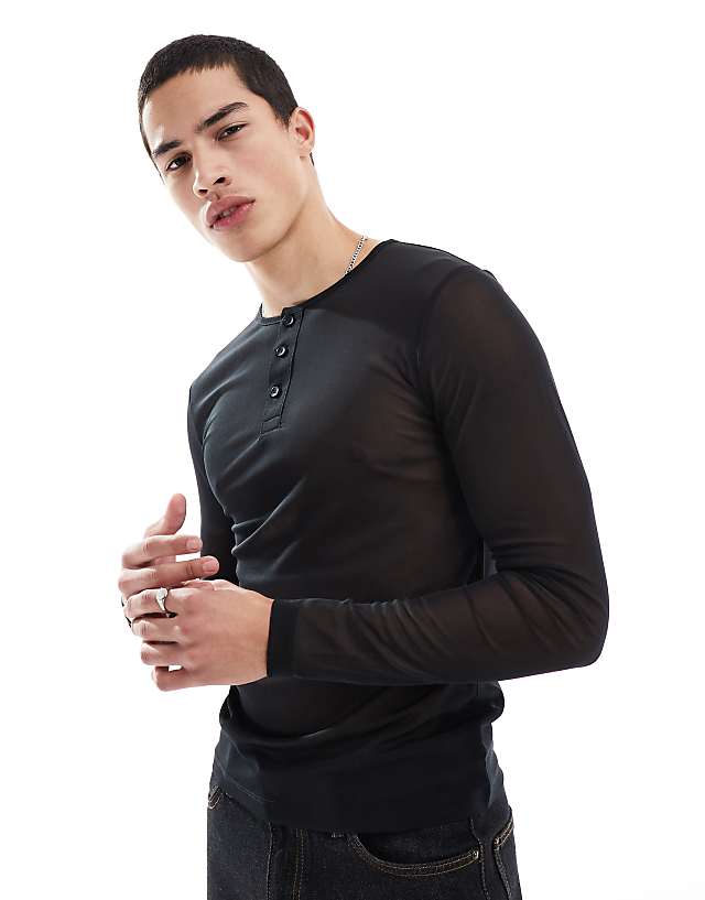 ASOS DESIGN muscle fit long sleeve t-shirt in black mesh with henley neck