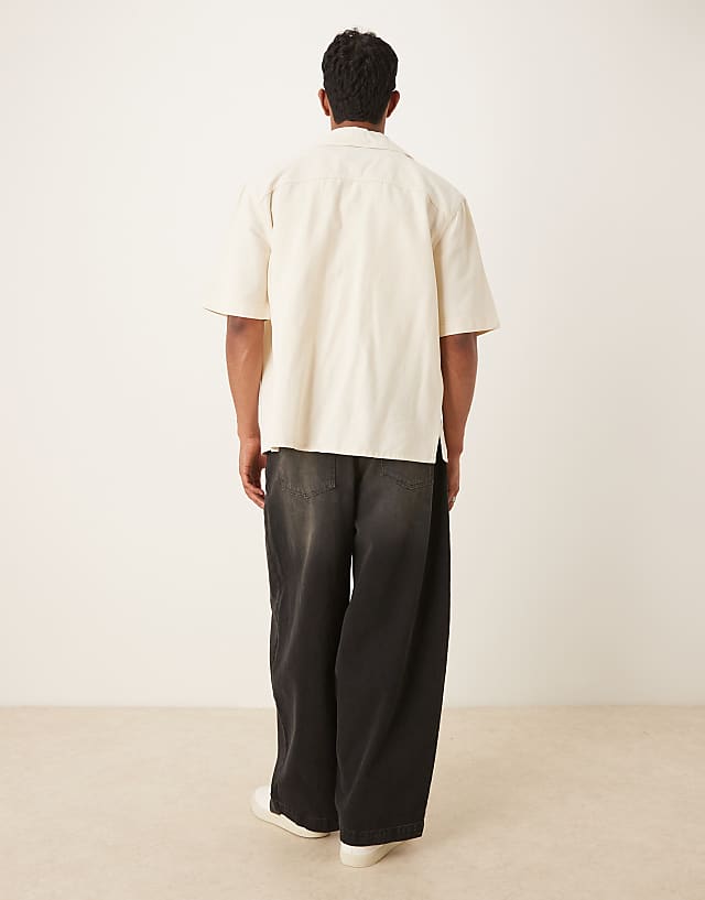 ASOS DESIGN Oversized Baggy Jeans In Black Wash With Brown Tint