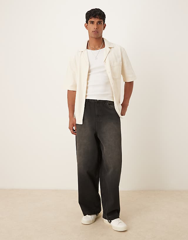 ASOS DESIGN Oversized Baggy Jeans In Black Wash With Brown Tint