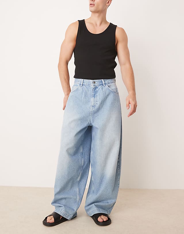 ASOS DESIGN oversized baggy pleated jeans in light wash blue