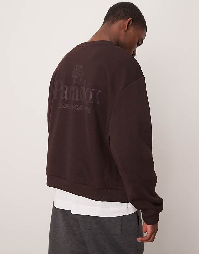 ASOS DESIGN Oversized Boxy Sweatshirt With Underarm Panels And Chest Print In Dark Brown