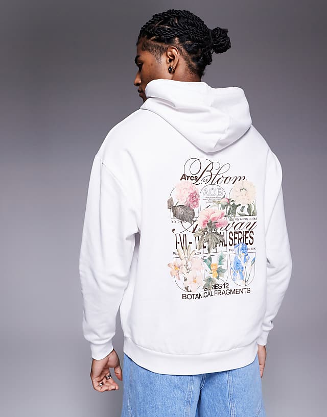 ASOS DESIGN oversized hoodie with floral prints in white