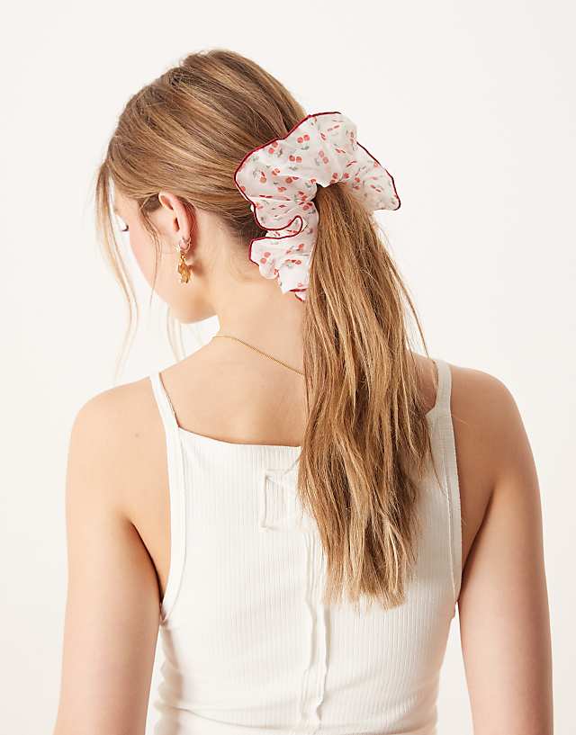 ASOS DESIGN Oversized Scrunchie With Cherry Print And Contrast Binding In Red