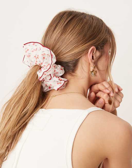 ASOS DESIGN oversized scrunchie with cherry print and contrast binding in red