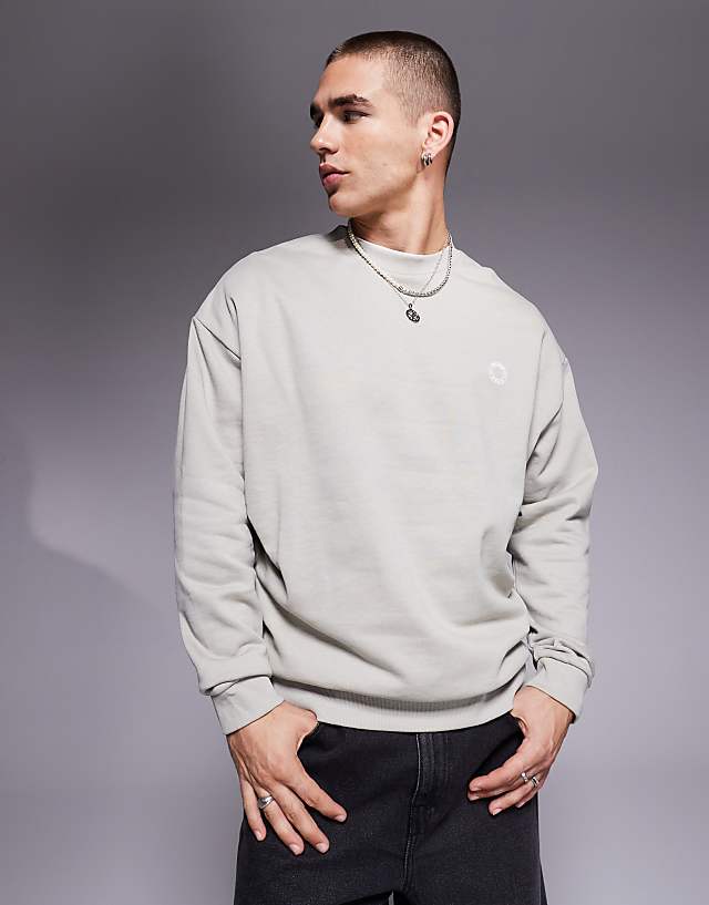 ASOS DESIGN Oversized Sweatshirt With Beer Mat Prints In Grey