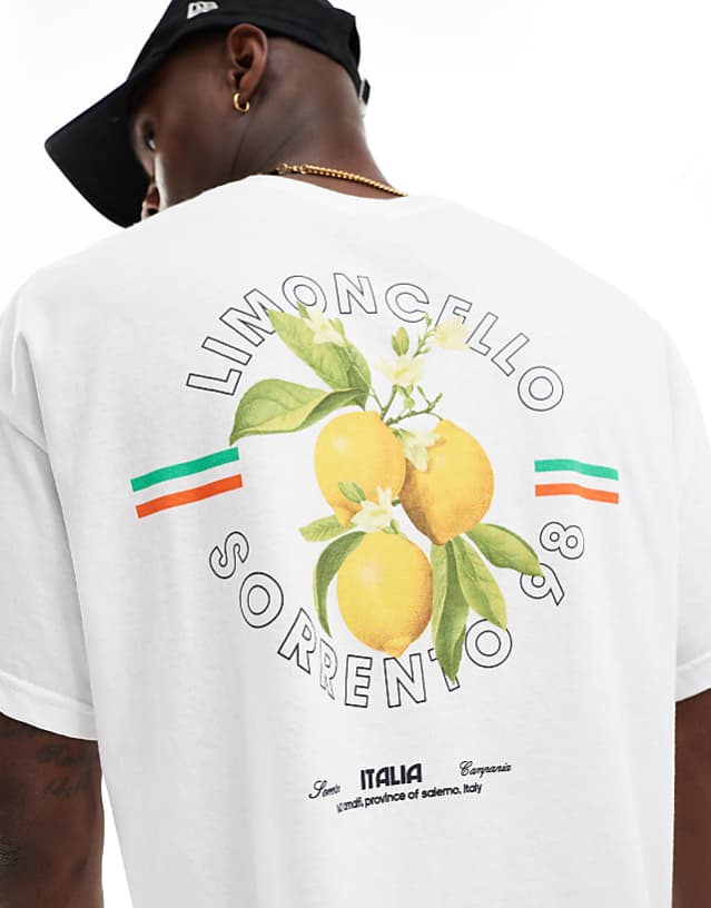 ASOS DESIGN oversized t-shirt with limoncello graphic in white