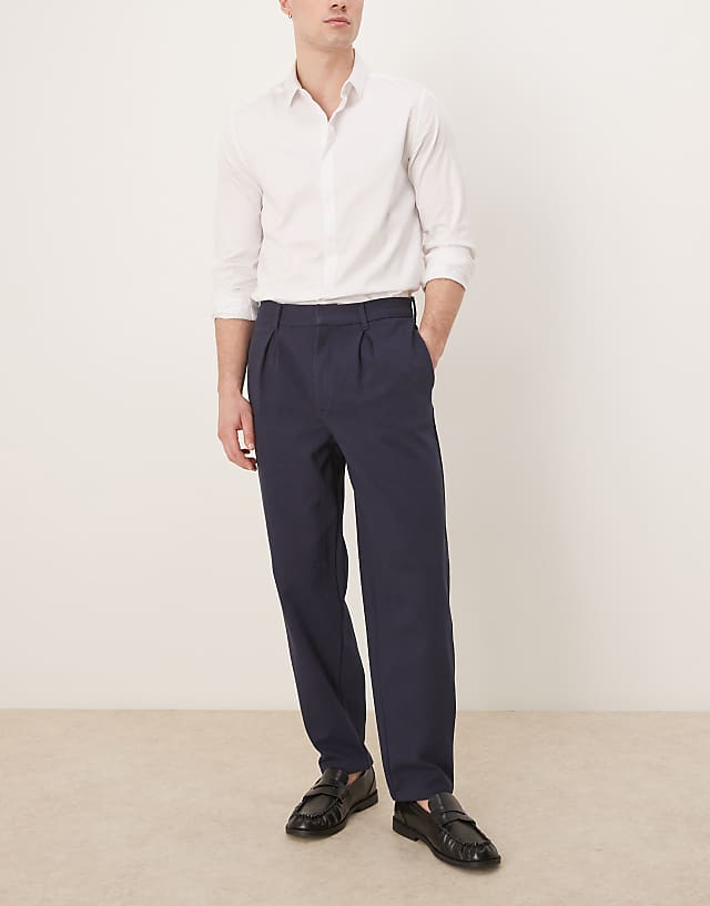 ASOS DESIGN oversized tapered trouser with pleat in navy