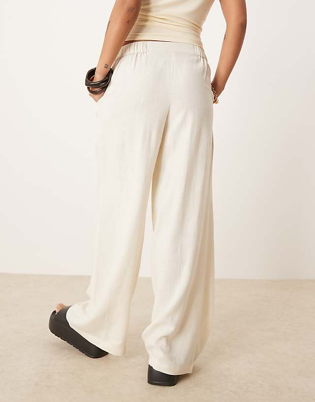 ASOS DESIGN Petite Relaxed Straight Leg Trousers With Linen In Off White
