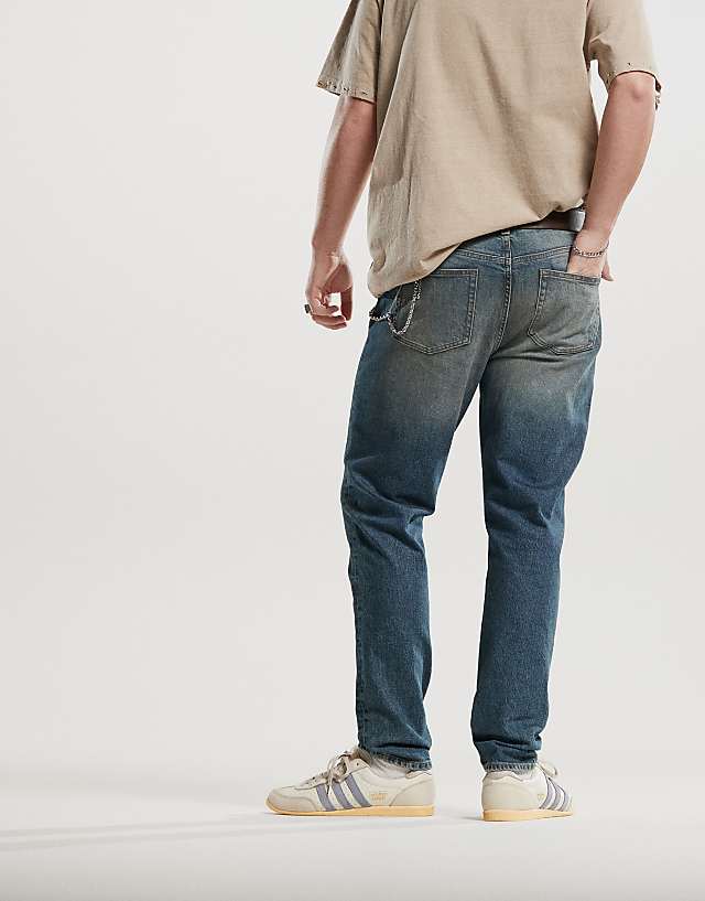 ASOS DESIGN Skinny Jeans With Tint In Dark Wash Blue