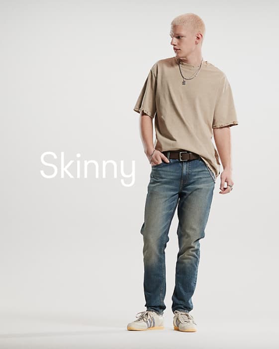 ASOS DESIGN skinny jeans with tint in dark wash blue