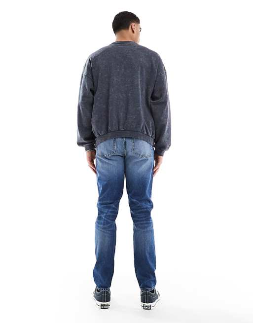 ASOS DESIGN Skinny Jeans With Tint In Mid Wash Blue