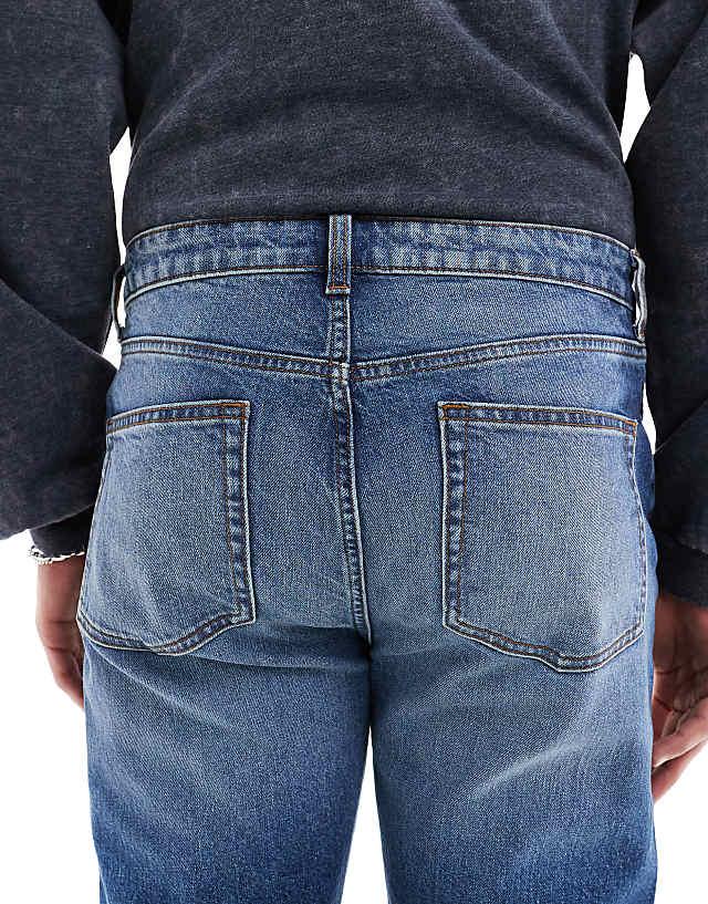 ASOS DESIGN Skinny Jeans With Tint In Mid Wash Blue