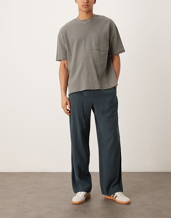 ASOS DESIGN smart wide leg trousers in dark blue with elasticated waist and side stripes