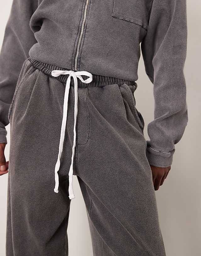 ASOS DESIGN Super Baggy Joggers With Ribbed Texture In Washed Black