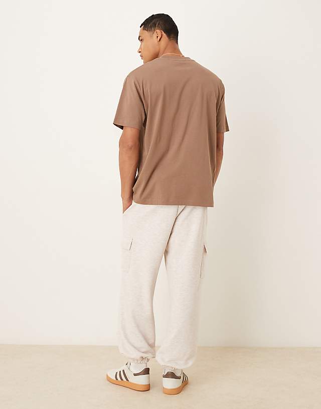 ASOS DESIGN Tapered Fit Loopback Jogger With Cargo Pockets In Stone