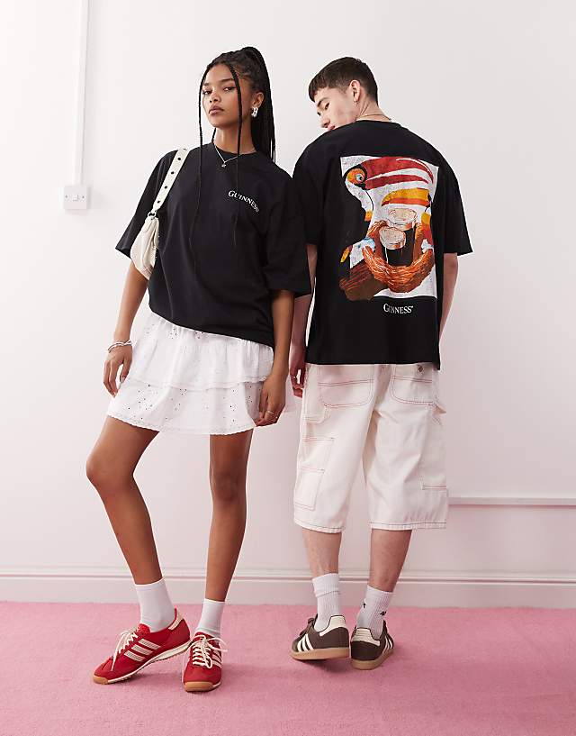 ASOS DESIGN Unisex Oversized T-shirt With Guinness Prints In Black