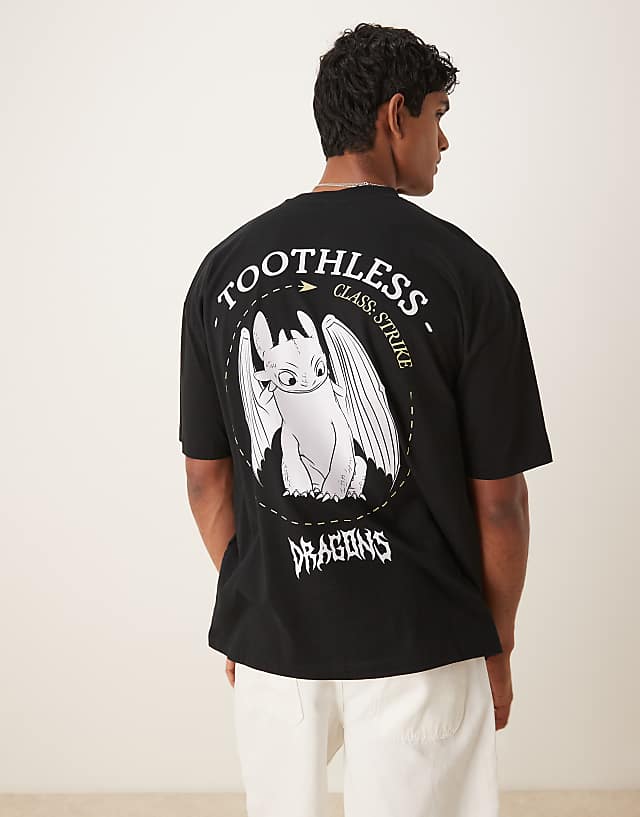 ASOS DESIGN Unisex Oversized T-shirt With How To Train Your Dragon Toothless Prints In Black