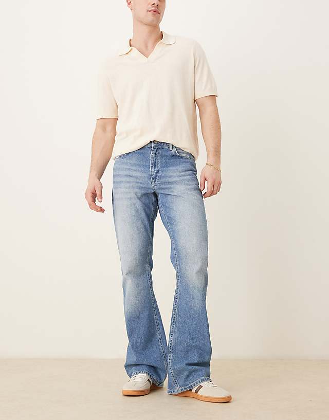 ASOS DESIGN vintage flare jeans in light wash blue