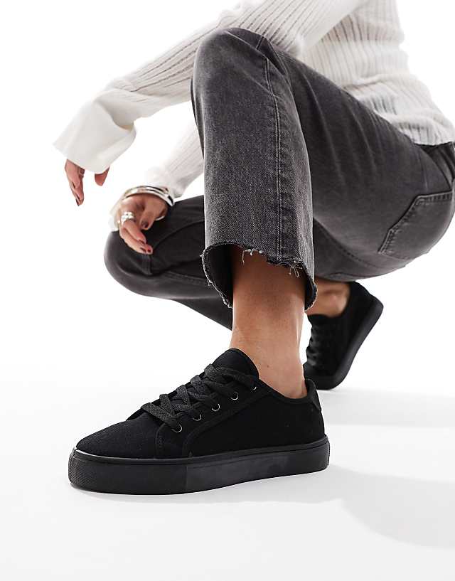 ASOS DESIGN Wide Fit Dizzy Lace Up Trainers In Black Drench