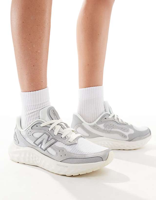 New Balance Arishi running trainers in silver