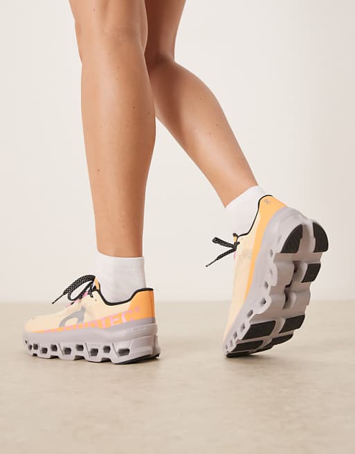 ON Cloudmonster Running Trainers In Coral